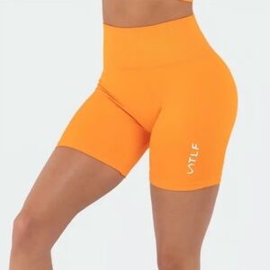 TLF Sculpt Seamless Scrunch Butt High Waisted Orange Bike Shorts, Medium